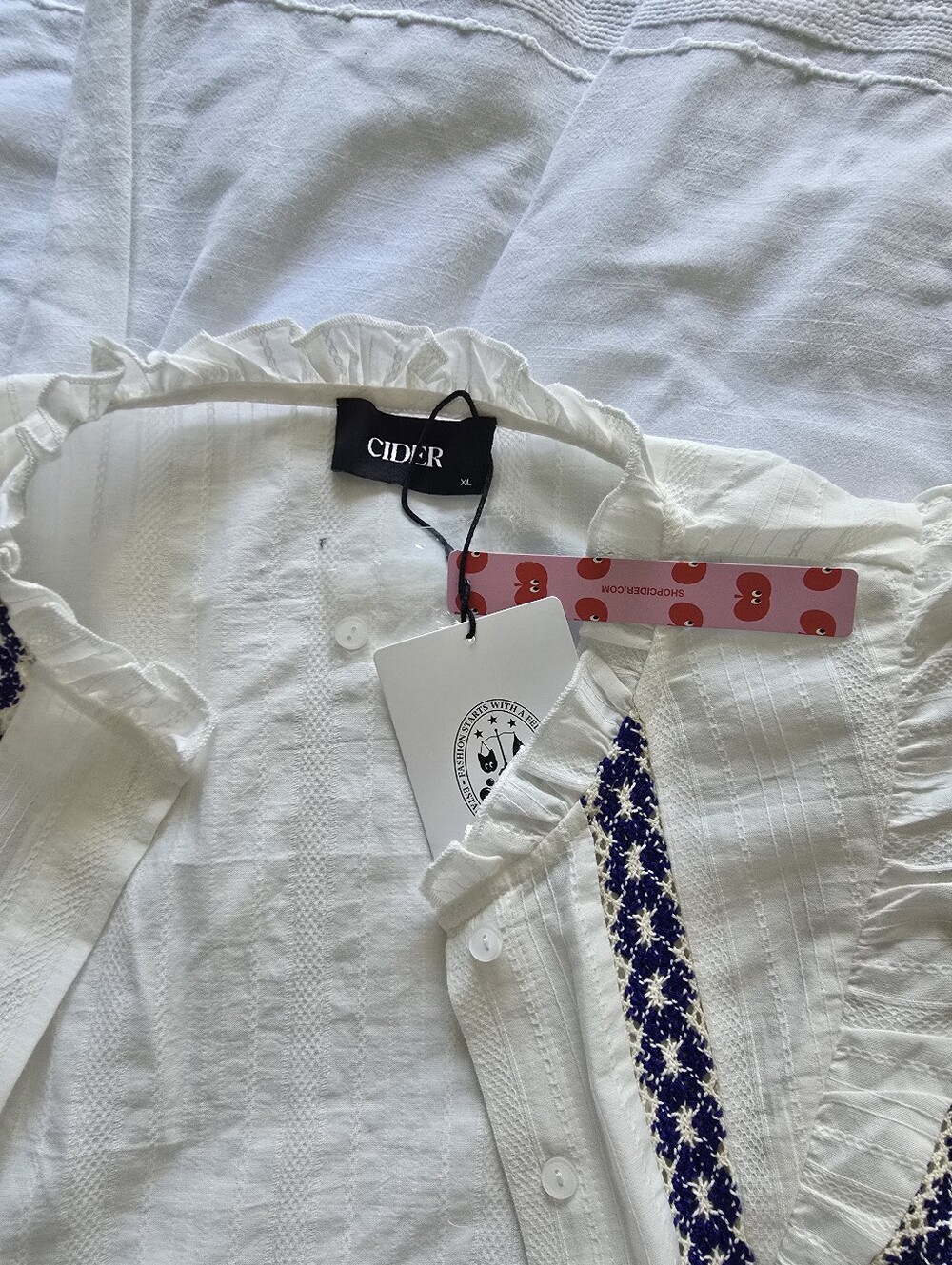 Cider Cream Sleeveless Embroidered Ruffle Top with Blue Trim - Picture 2 of 5